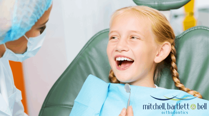 Mitchell, Bartlett & Bell Orthodontics after treatment kids very much satisfy her smile said that