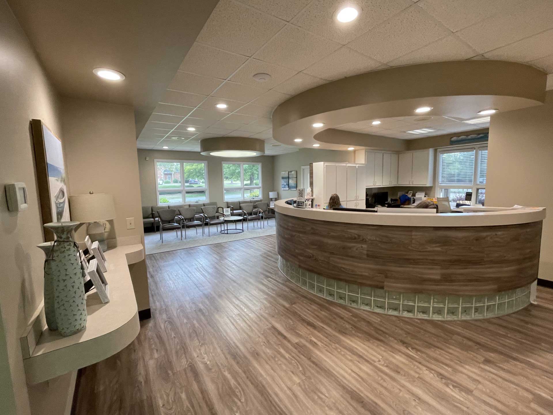 Mitchell, Bartlett & Bell Orthodontics waiting room and desk area